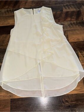 Esley Cream Sleeveless Ruffle Front Top